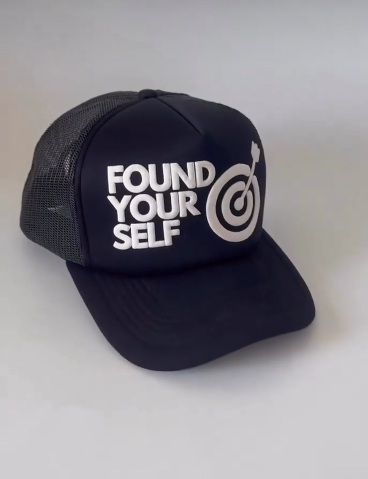 "Found Yourself Bullseye Trucker Cap - Precision Meets Purpose"